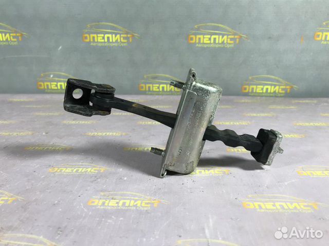 Ограничитель двери передний Opel Corsa D