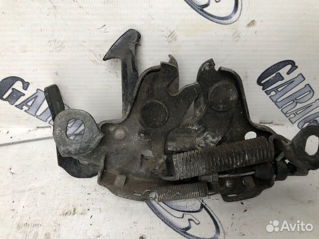 Замок капота nissan tiida