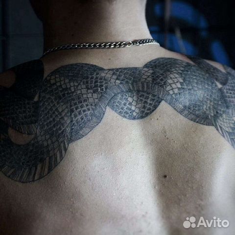 Мастер татуировки