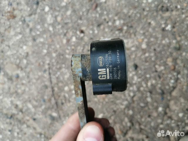 Датчик положения кузова на Opel Astra H Датчик положения кузова на Opel Astra H
