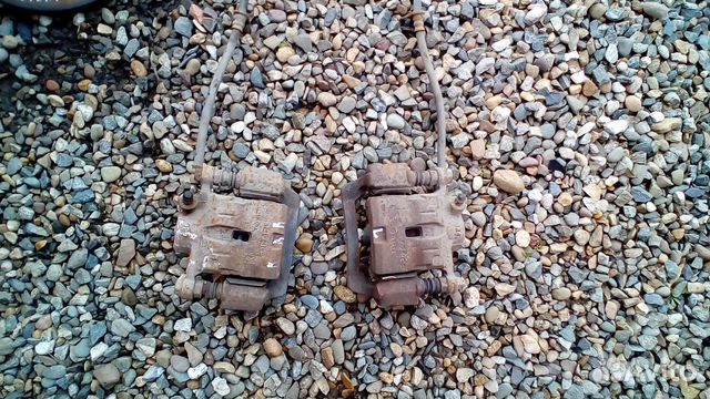 Суппорт тормозной заданий субару импреза