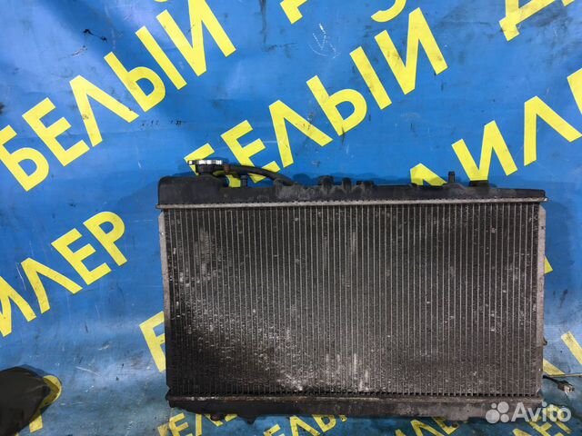 Радиатор диффузор Nissan Primera P10