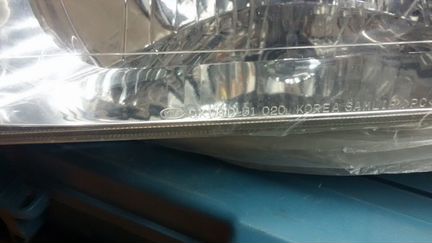 Фара Kia Sportage