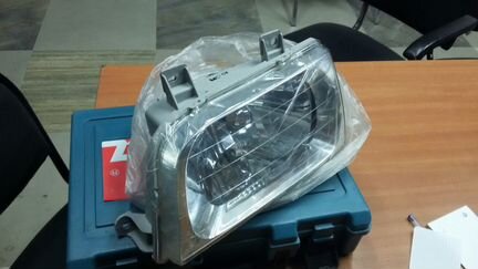 Фара Kia Sportage