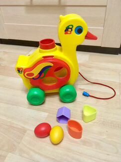 Развивающая игрушка Каталка сортер Уточка-несушка