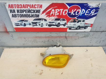 Фонарь противотуманный передний левый Ssang Yong